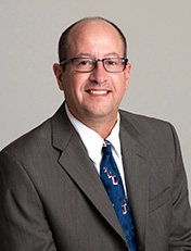 Dr. Lucius Doucet III